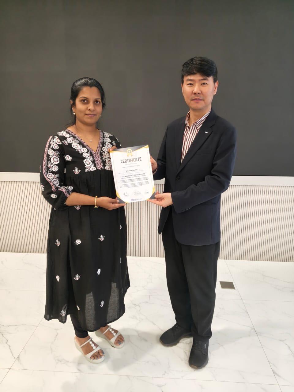 Dr. Vinodha C. with a dental tourism patient at VSmile Dental Studio, Coimbatore